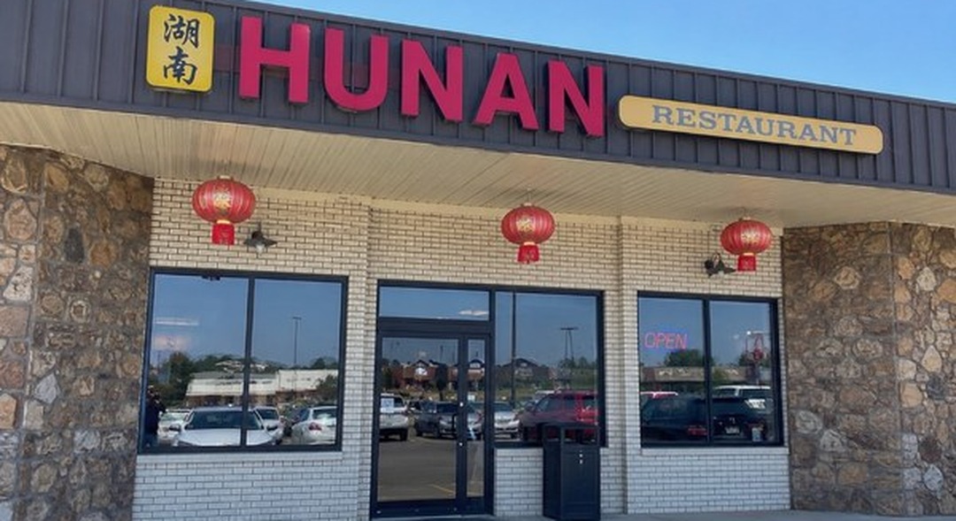 Hunan Restaurant storefront with red lanterns and HUNAN RESTAURANT sign