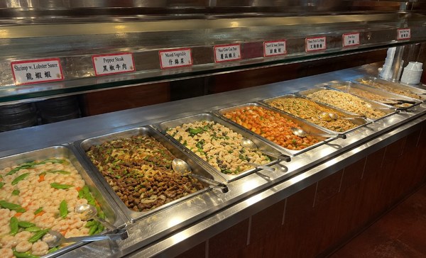 Chinese buffet dishes including fried rice, lo mein, and General Tso's chicken